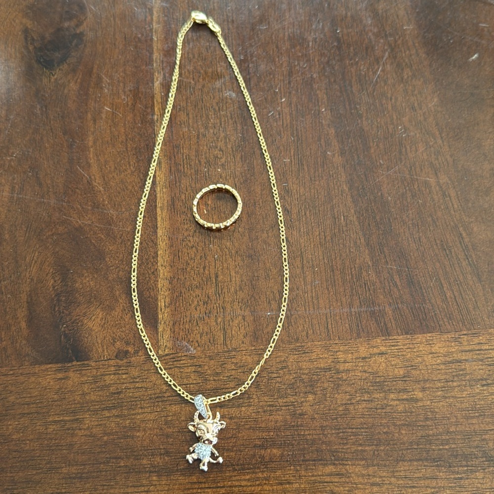 Elegant Gold Necklace with Crystal dancing cow Pendant
